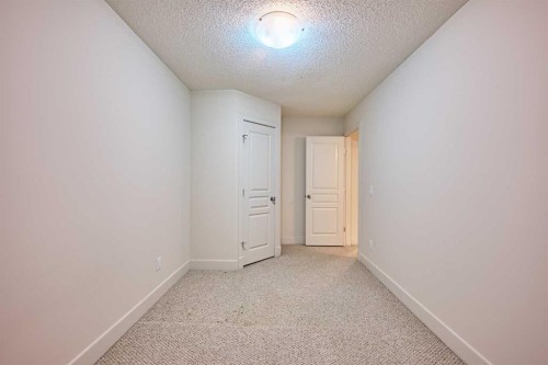 250 Strathridge Place Sw, Calgary, AB - Indoor Photo Showing Other Room
