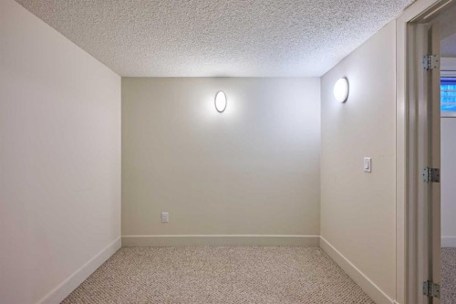 250 Strathridge Place Sw, Calgary, AB - Indoor Photo Showing Other Room