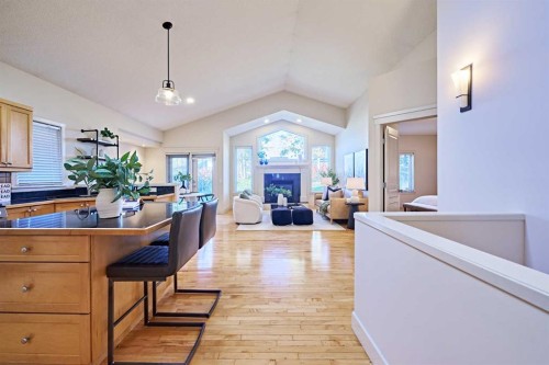 250 Strathridge Place Sw, Calgary, AB - Indoor With Fireplace