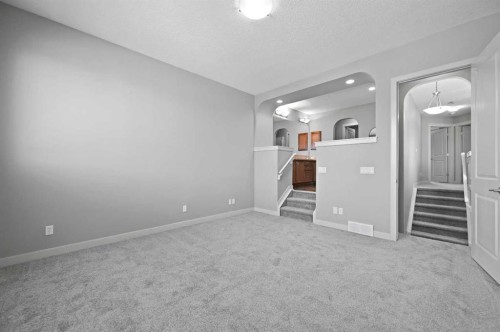 229 Bridlerange Place Sw, Calgary, AB - Indoor Photo Showing Other Room