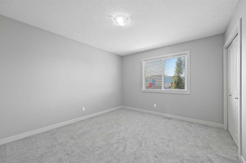 229 Bridlerange Place Sw, Calgary, AB - Indoor Photo Showing Other Room