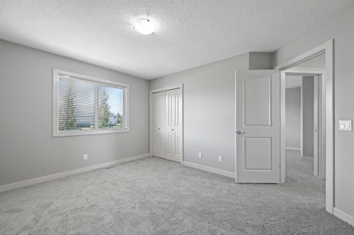 229 Bridlerange Place Sw, Calgary, AB - Indoor Photo Showing Other Room