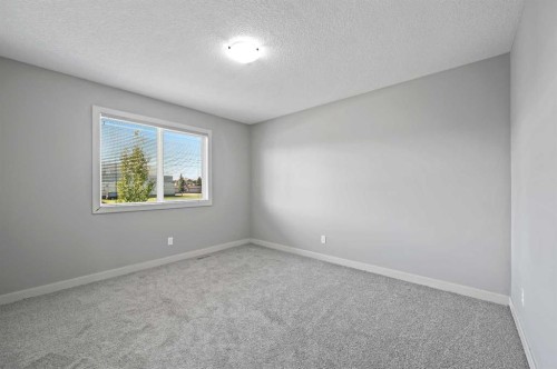 229 Bridlerange Place Sw, Calgary, AB - Indoor Photo Showing Other Room