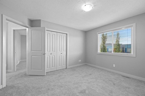 229 Bridlerange Place Sw, Calgary, AB - Indoor Photo Showing Other Room