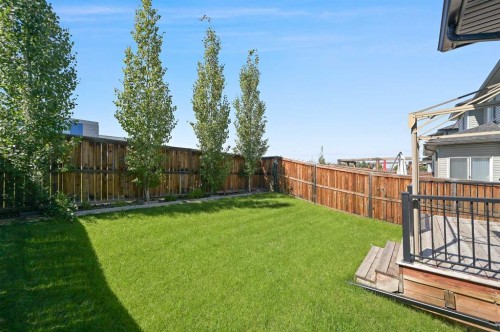 229 Bridlerange Place Sw, Calgary, AB - Outdoor With Backyard