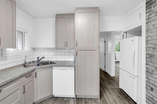1212 Bantry Street Ne, Calgary, AB - Indoor Photo Showing Kitchen With Double Sink