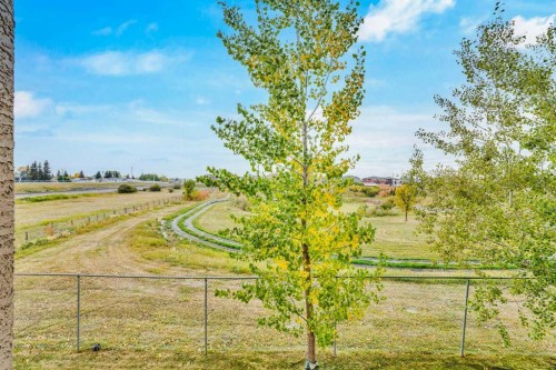 6211-304 Mackenzie Way Sw, Airdrie, AB - Outdoor With View