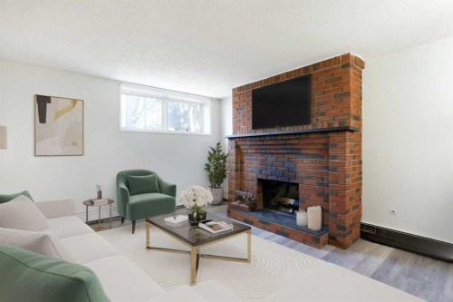 4004 79 Street Nw, Calgary, AB - Indoor Photo Showing Living Room With Fireplace