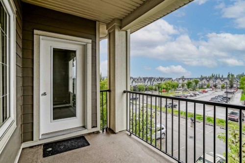 303-100 Cranfield Common Se, Calgary, AB - Outdoor With Balcony With Exterior
