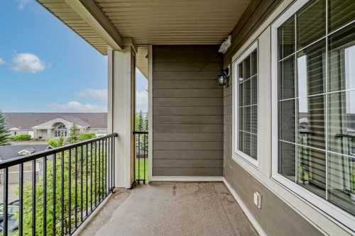 303-100 Cranfield Common Se, Calgary, AB - Outdoor With Deck Patio Veranda With Exterior