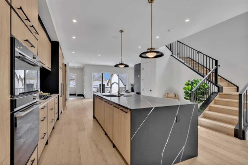 330 Normandy Drive Sw, Calgary, AB - Indoor Photo Showing Kitchen With Upgraded Kitchen