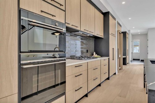 330 Normandy Drive Sw, Calgary, AB - Indoor Photo Showing Kitchen With Upgraded Kitchen