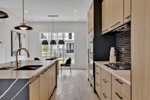 330 Normandy Drive Sw, Calgary, AB - Indoor Photo Showing Kitchen With Upgraded Kitchen