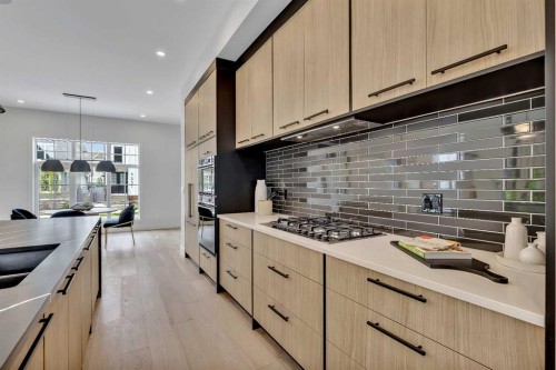 330 Normandy Drive Sw, Calgary, AB - Indoor Photo Showing Kitchen With Upgraded Kitchen