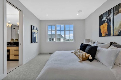 330 Normandy Drive Sw, Calgary, AB - Indoor Photo Showing Bedroom