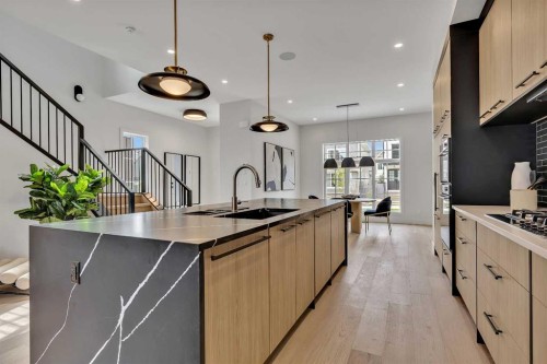 330 Normandy Drive Sw, Calgary, AB - Indoor Photo Showing Kitchen With Upgraded Kitchen