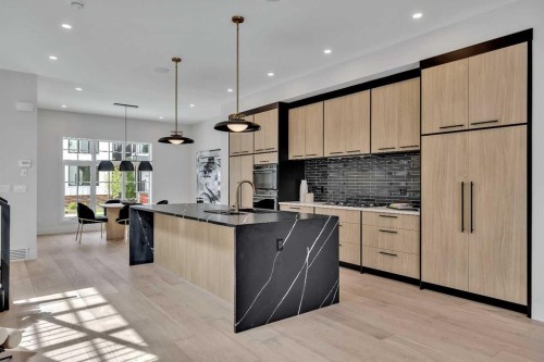 330 Normandy Drive Sw, Calgary, AB - Indoor Photo Showing Kitchen With Upgraded Kitchen