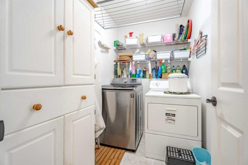 41 Everridge Court Sw, Calgary, AB - Indoor Photo Showing Laundry Room