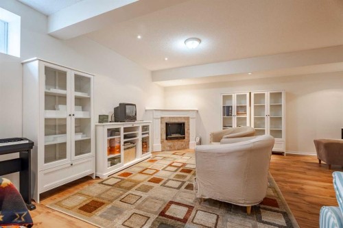 41 Everridge Court Sw, Calgary, AB - Indoor With Fireplace