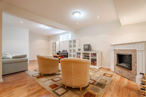 41 Everridge Court Sw, Calgary, AB - Indoor With Fireplace