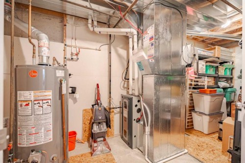 41 Everridge Court Sw, Calgary, AB - Indoor Photo Showing Basement