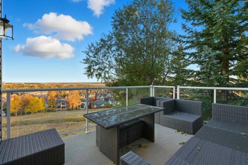 146 Springbluff Heights Sw, Calgary, AB - Outdoor With Deck Patio Veranda
