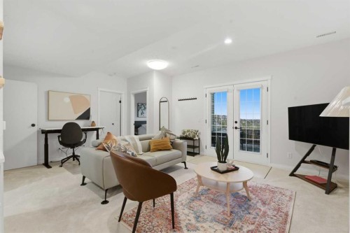 146 Springbluff Heights Sw, Calgary, AB - Indoor Photo Showing Living Room