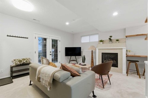 146 Springbluff Heights Sw, Calgary, AB - Indoor With Fireplace
