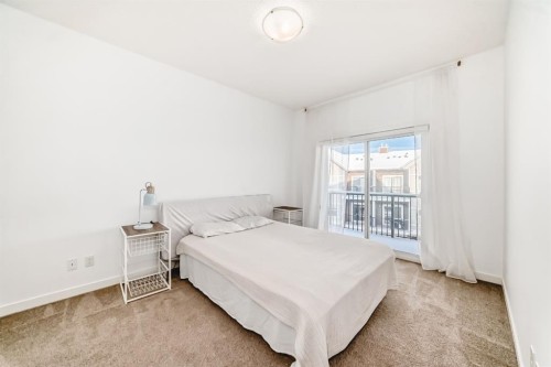 802-250 Fireside View, Cochrane, AB - Indoor Photo Showing Bedroom