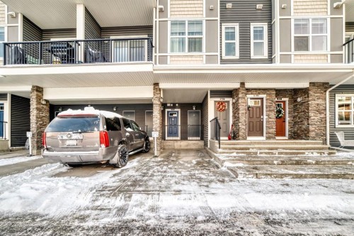 802-250 Fireside View, Cochrane, AB - Outdoor With Balcony With Facade