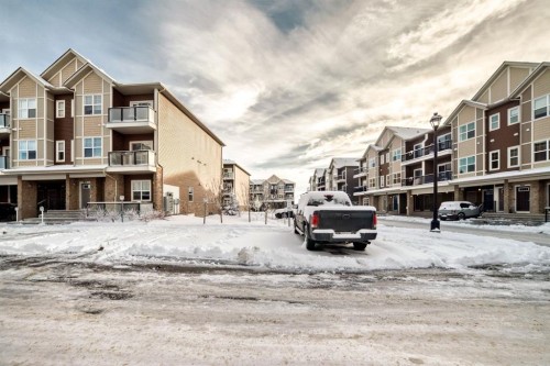 802-250 Fireside View, Cochrane, AB - Outdoor With Balcony With Facade