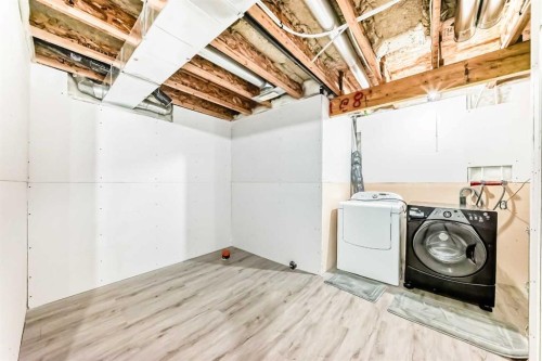 715 Copperfield Boulevard Se, Calgary, AB - Indoor Photo Showing Laundry Room