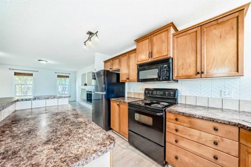 715 Copperfield Boulevard Se, Calgary, AB - Indoor Photo Showing Kitchen