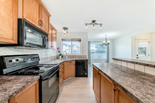 715 Copperfield Boulevard Se, Calgary, AB - Indoor Photo Showing Kitchen