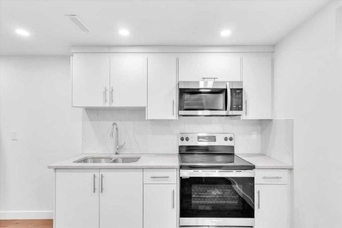 99 Shawmeadows Close Sw, Calgary, AB - Indoor Photo Showing Kitchen With Double Sink With Upgraded Kitchen