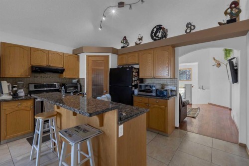 255 Panamount Lane Nw, Calgary, AB - Indoor Photo Showing Kitchen With Double Sink