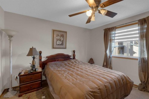 255 Panamount Lane Nw, Calgary, AB - Indoor Photo Showing Bedroom