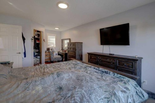 43 Canoe Square Sw, Airdrie, AB - Indoor Photo Showing Bedroom