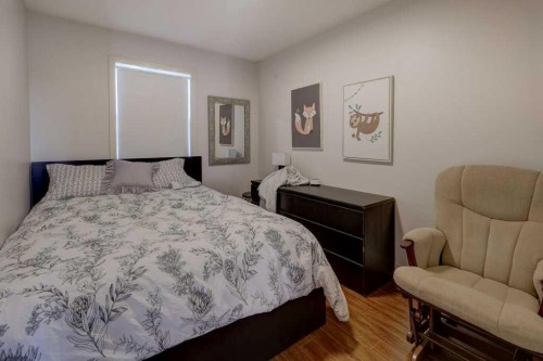 43 Canoe Square Sw, Airdrie, AB - Indoor Photo Showing Bedroom