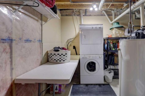 43 Canoe Square Sw, Airdrie, AB - Indoor Photo Showing Laundry Room