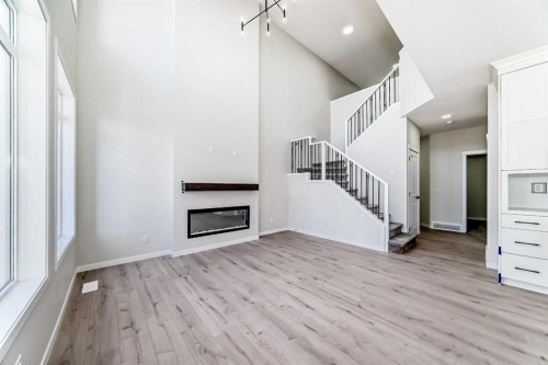 105 Corner Glen Green Ne, Calgary, AB - Indoor Photo Showing Other Room With Fireplace