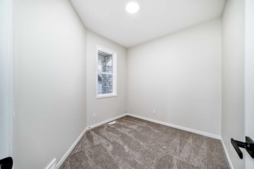 105 Corner Glen Green Ne, Calgary, AB - Indoor Photo Showing Other Room
