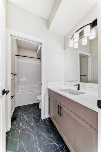 105 Corner Glen Green Ne, Calgary, AB - Indoor Photo Showing Bathroom