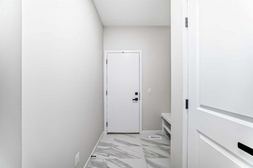 105 Corner Glen Green Ne, Calgary, AB - Indoor Photo Showing Other Room