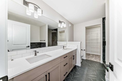105 Corner Glen Green Ne, Calgary, AB - Indoor Photo Showing Bathroom