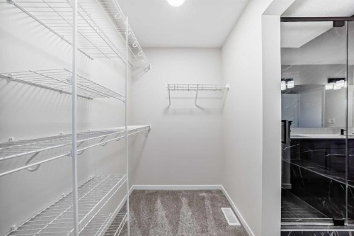 105 Corner Glen Green Ne, Calgary, AB - Indoor With Storage