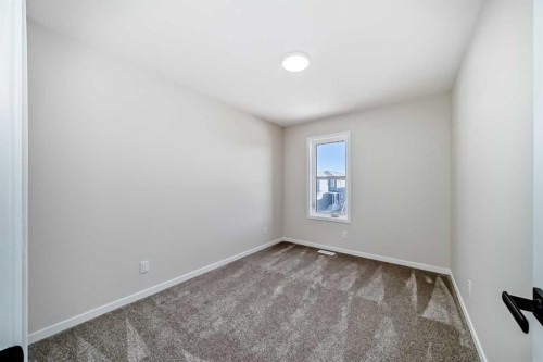 105 Corner Glen Green Ne, Calgary, AB - Indoor Photo Showing Other Room