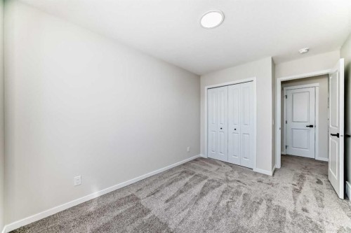 105 Corner Glen Green Ne, Calgary, AB - Indoor Photo Showing Other Room