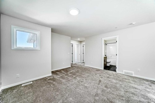 105 Corner Glen Green Ne, Calgary, AB - Indoor Photo Showing Other Room