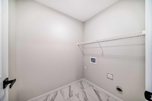105 Corner Glen Green Ne, Calgary, AB - Indoor With Storage